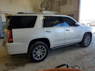 2015 GMC Yukon Denali with VIN 1GKS2CKJ7FR266750, listed as a Copart auction lot 47882125 with 121,705 mi miles and Salvage Title. Bid and sale history available at carsss.com. Image 3.