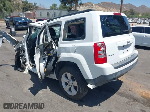 2014 Jeep Patriot Latitude with VIN 1C4NJRFB4ED549734, listed as a IAAI auction lot 42543649 with Not provided miles and . Bid and sale history available at DreamBid. Image 3.