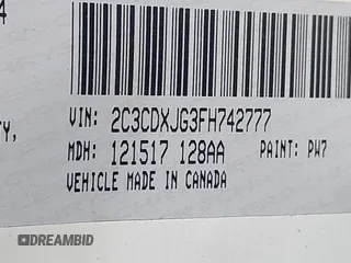 2015 Dodge Charger SXT with VIN 2C3CDXJG3FH742777, listed as a IAAI auction lot 42763427 with 151,409 mi miles and . Bid and sale history available at DreamBid. Image 9.