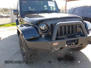2014 Jeep Wrangler Unlimited Sahara with VIN 1C4BJWEG0EL306202, listed as a IAAI auction lot 41784330 with 79,123 mi miles. Bid and sale history available at carsss.com. Image 6.