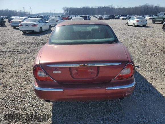 2005 Jaguar XJ Vanden Plas z VIN SAJWA82C75SG33074, wystawiony jako Copart lot #48725755 z przebiegiem 129 817 mil mil oraz Czysty tytuł • Clean title. Historia ofert i sprzedaży dostępna na DreamBid. Obrazek 6.