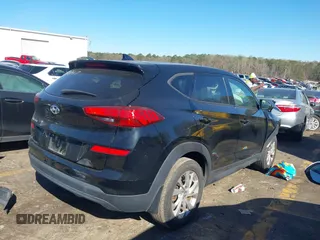 2021 Hyundai Tucson SE with VIN KM8J23A40MU334847, listed as a IAAI auction lot 41817556 with 63,000 mi miles and . Bid and sale history available at DreamBid. Image 4.