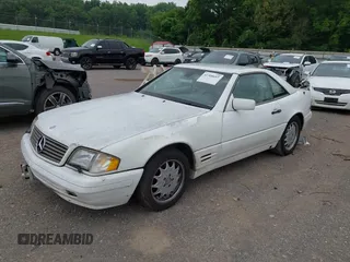 1997 Mercedes-Benz SL 500 z VIN WDBFA63F0VF146394, wystawiony jako IAAI lot #42308697 z przebiegiem 106 935 mil mil oraz . Historia ofert i sprzedaży dostępna na DreamBid. Obrazek 2.