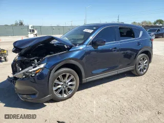 2021 Mazda CX-5 Signature with VIN JM3KFBEYXM0453766, listed as a Copart auction lot 45902795 with 26,066 mi miles and Salvage Title. Bid and sale history available at carsss.com. Image 1.