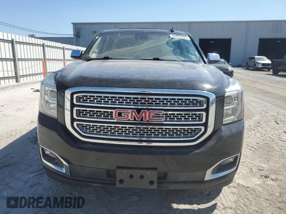 2018 GMC Yukon SLT with VIN 1GKS1BKC9JR108210, listed as a Copart auction lot 50465765 with 106,542 mi miles and Salvage Title. Bid and sale history available at carsss.com. Image 5.