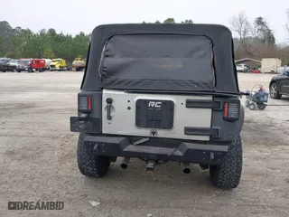 2007 Jeep Wrangler Unlimited X with VIN 1J4GA391X7L107424, listed as a IAAI auction lot 41752013 with 196,557 mi miles. Bid and sale history available at carsss.com. Image 16.