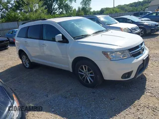 2015 Dodge Journey SXT with VIN 3C4PDCBG4FT605780, listed as a IAAI auction lot 42656022 with 140,000 mi miles and . Bid and sale history available at DreamBid. Image 1.