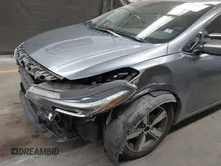 2018 Kia Forte LX with VIN 3KPFL4A76JE210647, listed as a IAAI auction lot 41838853 with 148,488 mi miles and . Bid and sale history available at DreamBid. Image 6.