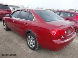 2008 Kia Optima LX with VIN KNAGE123885257626, listed as a IAAI auction lot 42072433 with 106,572 mi miles. Bid and sale history available at carsss.com. Image 3.
