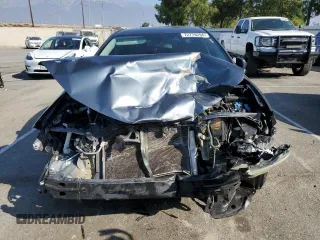 2016 Toyota Corolla L with VIN 5YFBURHE6GP393018, listed as a Copart auction lot 56256975 with 134,957 mi miles and Salvage Title. Bid and sale history available at DreamBid. Image 5.