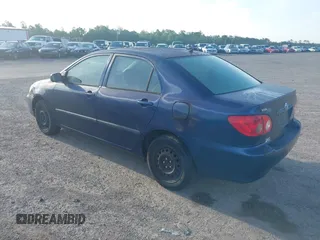 2005 Toyota Corolla CE with VIN 1NXBR32E25Z563569, listed as a IAAI auction lot 42100384 with 243,610 mi miles and . Bid and sale history available at DreamBid. Image 3.