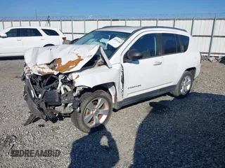 2012 Jeep Compass Latitude with VIN 1C4NJCEA2CD706809, listed as a IAAI auction lot 40956063 with 159,976 mi miles and . Bid and sale history available at carsss.com. Image 2.