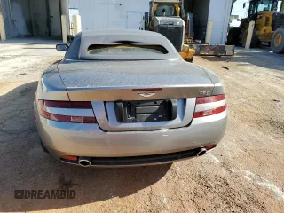 2007 Aston Martin DB9 z VIN SCFAD02A47GB07685, wystawiony jako Copart lot #75868414 z przebiegiem Nie podano mil oraz Szkody całkowita. Historia ofert i sprzedaży dostępna na DreamBid. Obrazek 6.