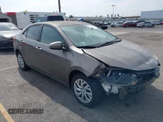 2018 Toyota Corolla L with VIN 5YFBURHE6JP774827, listed as a IAAI auction lot 42598086 with 29,400 mi miles and . Bid and sale history available at DreamBid. Image 1.