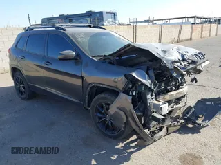 2014 Jeep Cherokee Latitude with VIN 1C4PJMCBXEW317384, listed as a IAAI auction lot 41621635 with 180,971 mi miles and . Bid and sale history available at DreamBid. Image 1.
