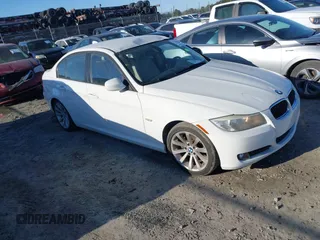 2011 BMW 3 Series 328i with VIN WBAPH7C57BE675578, listed as a IAAI auction lot 41844032 with 57,324 mi miles. Bid and sale history available at carsss.com. Image 1.