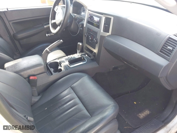 2010 Jeep Grand Cherokee Laredo with VIN 1J4PS4GK6AC112447, listed as a IAAI auction lot 42086245 with 150,875 mi miles. Bid and sale history available at carsss.com. Image 5.
