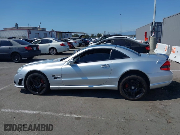 2009 Mercedes-Benz SL 55/63 AMG with VIN WDBSK70F69F148436, listed as a IAAI auction lot 42770233 with 120,523 mi miles and . Bid and sale history available at DreamBid. Image 14.