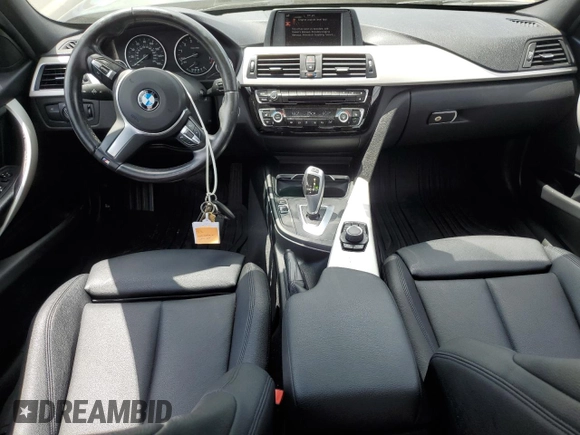 2017 BMW 3 Series 320i xDrive with VIN WBA8E5G37HNU43470, listed as a Copart auction lot 63482795 with 111,647 mi miles and Salvage title. Bid and sale history available at DreamBid. Image 8.