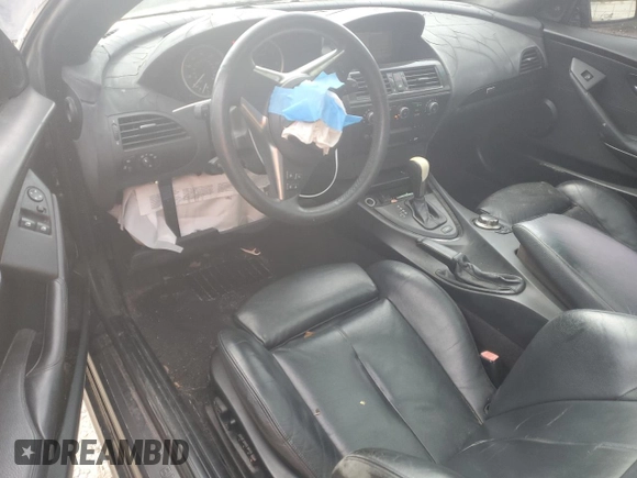 2007 BMW 6 Series 650i z VIN WBAEH13567CR51918, wystawiony jako Copart lot #76337784 z przebiegiem 135 313 mil mil oraz Szkoda całkowita • Salvage title. Historia ofert i sprzedaży dostępna na DreamBid. Obrazek 8.