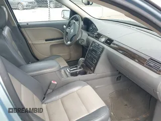 2009 Mercury Sable Premier z VIN 1MEHM42W19G619838, wystawiony jako IAAI lot #42169092 z przebiegiem 168 155 mil mil oraz . Historia ofert i sprzedaży dostępna na DreamBid. Obrazek 5.