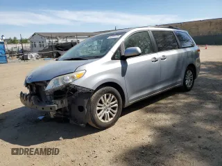 2011 Toyota Sienna XLE AAS with VIN 5TDYK3DC8BS167404, listed as a Copart auction lot 54101175 with 159,272 mi miles and Salvage title. Bid and sale history available at DreamBid. Image 1.