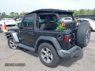 2018 Jeep Wrangler Sport S with VIN 1C4GJXAN8JW290064, listed as a IAAI auction lot 42012484 with 93,838 mi miles and . Bid and sale history available at DreamBid. Image 3.