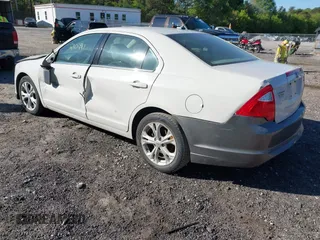 2012 Ford Fusion SE with VIN 3FAHP0HA9CR402640, listed as a IAAI auction lot 42052610 with 210,441 mi miles and . Bid and sale history available at carsss.com. Image 3.