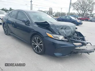 2019 Toyota Camry LE z VIN 4T1B11HK0KU756212, wystawiony jako IAAI lot #41618728 z przebiegiem 154 053 mil mil oraz . Historia ofert i sprzedaży dostępna na DreamBid. Obrazek 1.