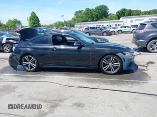 2015 BMW 4 Series 435i with VIN WBA3R1C56FK194060, listed as a IAAI auction lot 42061619 with 153,384 mi miles and . Bid and sale history available at DreamBid. Image 13.