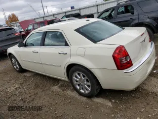 2009 Chrysler 300 Limited with VIN 2C3KA33V39H590917, listed as a Copart auction lot 77657054 with 180,613 mi miles and Clean Title. Bid and sale history available at carsss.com. Image 2.