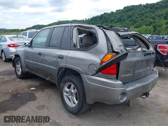 2007 GMC Envoy SLE with VIN 1GKDS13S272278285, listed as a IAAI auction lot 40006486 with 158,109 mi miles. Bid and sale history available at carsss.com. Image 3.