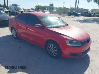 2011 Volkswagen Jetta Sedan SE w/Convenience & Sunroof with VIN 3VWDX7AJ1BM056944, listed as a IAAI auction lot 41782376 with 127,336 mi miles. Bid and sale history available at carsss.com. Image 1.