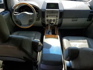 2004 Infiniti QX56 with VIN 5N3AA08C14N807476, listed as a Copart auction lot 75938334 with 200,675 mi miles and Salvage Title. Bid and sale history available at carsss.com. Image 8.