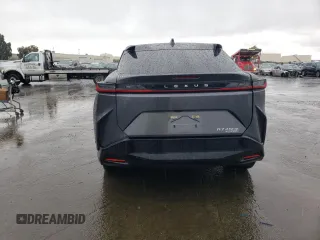2023 Lexus RZ 450e Premium z VIN JTJAAAABXPA013377, wystawiony jako Copart lot #41903324 z przebiegiem 6529 mil mil oraz . Historia ofert i sprzedaży dostępna na DreamBid. Obrazek 6.