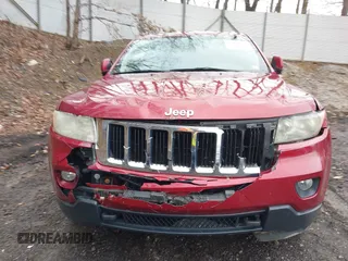 2012 Jeep Grand Cherokee Laredo with VIN 1C4RJFAG7CC123669, listed as a IAAI auction lot 42001472 with 164,806 mi miles. Bid and sale history available at carsss.com. Image 12.