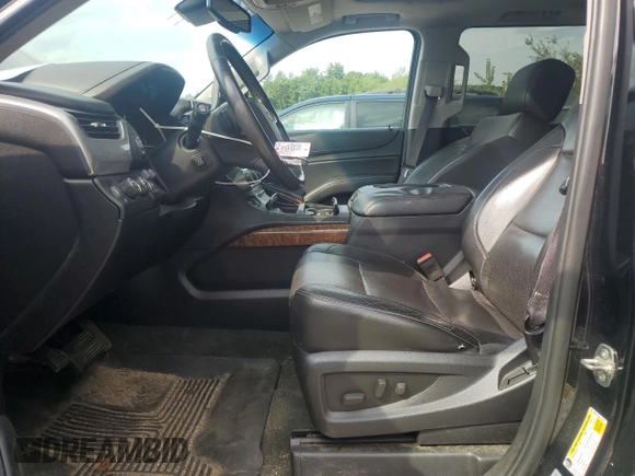 2015 Chevrolet Suburban LTZ with VIN 1GNSKKKC8FR199218, listed as a Copart auction lot 64147184 with 181,676 mi miles and Salvage Title. Bid and sale history available at DreamBid. Image 7.
