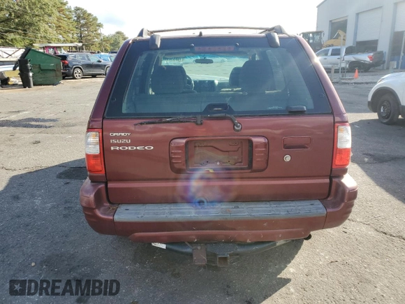 2002 Isuzu Rodeo S with VIN 4S2CK58W324325318, listed as a Copart auction lot 78851294 with 166,323 mi miles and Salvage Title. Bid and sale history available at DreamBid. Image 6.