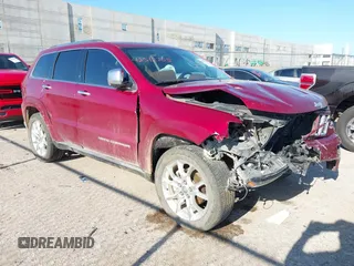2015 Jeep Grand Cherokee Summit with VIN 1C4RJEJG9FC100568, listed as a IAAI auction lot 42512705 with 128,413 mi miles and . Bid and sale history available at DreamBid. Image 1.