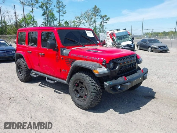 2020 Jeep Wrangler Unlimited Rubicon with VIN 1C4HJXFG9LW106607, listed as a IAAI auction lot 41908295 with 71,083 mi miles and . Bid and sale history available at DreamBid. Image 1.