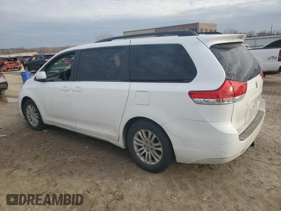 2012 Toyota Sienna XLE AAS with VIN 5TDYK3DC6CS277532, listed as a Copart auction lot 47453945 with 130,451 mi miles and Salvage Title. Bid and sale history available at carsss.com. Image 2.