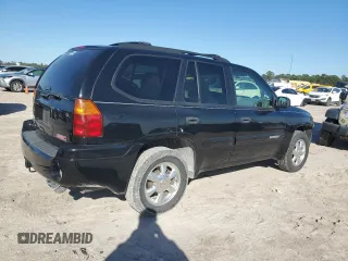 2005 GMC Envoy SLT with VIN 1GKDS13S352297652, listed as a Copart auction lot 41614205 with 71,937 mi miles and Salvage Title. Bid and sale history available at carsss.com. Image 3.