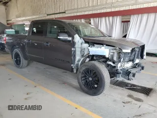 2018 Nissan Titan SV with VIN 1N6AA1E57JN515817, listed as a Copart auction lot 65537205 with 69,567 mi miles and Salvage title. Bid and sale history available at DreamBid. Image 4.