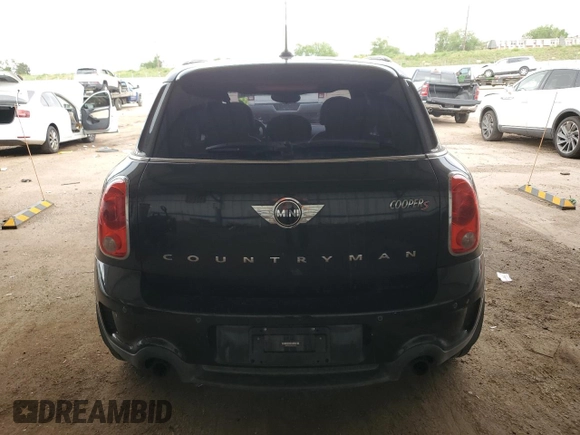 2014 MINI Countryman S with VIN WMWZC5C56EWP38065, listed as a Copart auction lot 59518395 with 91,106 mi miles and Salvage title. Bid and sale history available at DreamBid. Image 6.