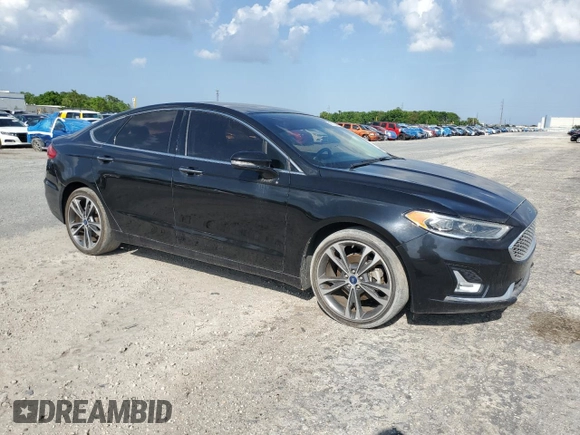 2019 Ford Fusion Titanium with VIN 3FA6P0D97KR184134, listed as a Copart auction lot 50913245 with 128,888 mi miles and Clean Title. Bid and sale history available at carsss.com. Image 4.