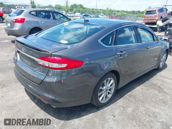 2017 Ford Fusion Titanium z VIN 3FA6P0SUXHR184919, wystawiony jako IAAI lot #42258918 z przebiegiem Nie podano mil oraz . Historia ofert i sprzedaży dostępna na DreamBid. Obrazek 4.