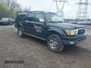 2001 Toyota Tacoma PreRunner with VIN 5TEGN92N71Z824334, listed as a IAAI auction lot 41961884 with 319,125 mi miles. Bid and sale history available at carsss.com. Image 1.