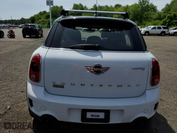 2014 MINI Countryman S z VIN WMWZC5C51EWP35221, wystawiony jako Copart lot #58718545 z przebiegiem 152 809 mil mil oraz Tytuł czysty. Historia ofert i sprzedaży dostępna na DreamBid. Obrazek 6.
