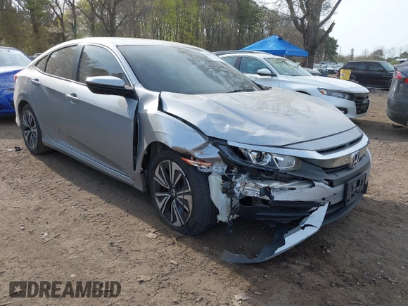 2018 Honda Civic Sedan LX with VIN 2HGFC2F5XJH573938, listed as a IAAI auction lot 42098109 with 69,037 mi miles. Bid and sale history available at carsss.com. Image 6.