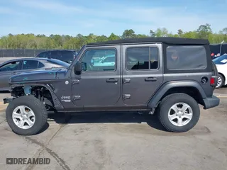 2020 Jeep Wrangler Unlimited Sport Altitude with VIN 1C4HJXDG7LW215344, listed as a IAAI auction lot 41924460 with 51,802 mi miles. Bid and sale history available at carsss.com. Image 15.